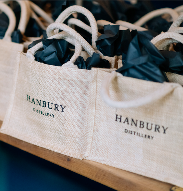 A close-up photo of the Hanbury Gin Mini Jute Bag, showcasing its stylish design and eco-friendly materials.