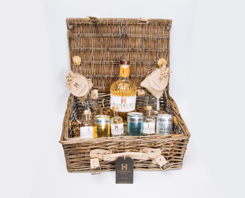 A beautifully arranged gin lovers hamper filled with a variety of premium gins, botanicals, and garnishes.