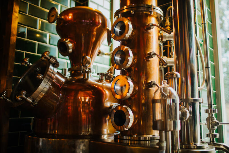 Hanbury Distillery's Gin Still Èace standing proudly in Islington.