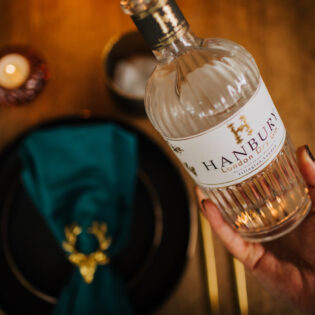 Pouring a glass of Hanbury London Dry Gin